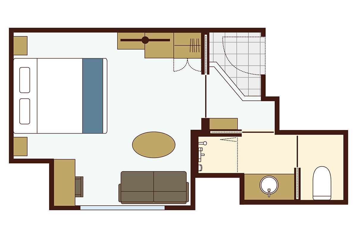 Distribución de una habitación de hotel con cama, sofá, mesa de comedor, zona de cocina y baño.