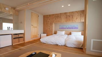 A bedroom with a wooden headboard, a bed, a bedside table, a mirror, and a painting on the wall.