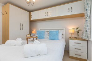 2 habitaciones, tabla de planchar con plancha, cuna de viaje y wifi