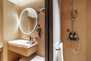 Shower, free toiletries, hair dryer, slippers