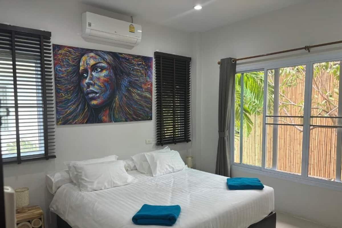 Villa Deluxe, vista al mar | Caja de seguridad en la habitación, cortinas blackout y wifi gratis