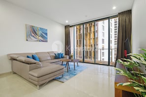 Apartment, 2 Bedrooms, City View | Living area | Flat-screen TV