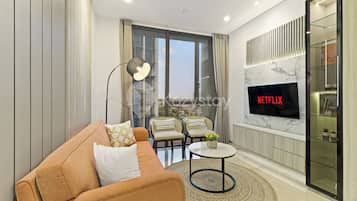 Apartment, 2 Bedrooms, City View | Living area | Flat-screen TV