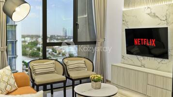 Apartment, 2 Bedrooms, City View | Living area | Flat-screen TV
