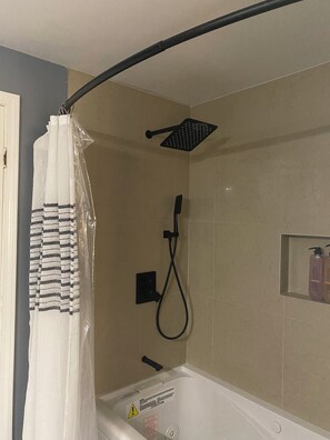 Jetted bath, hair dryer, towels, soap