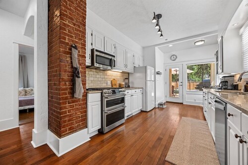 NEW! Fetch, Dine, & Unwind | Walkable Cottage Steps to North End Favs | Fun Times in Backyard!