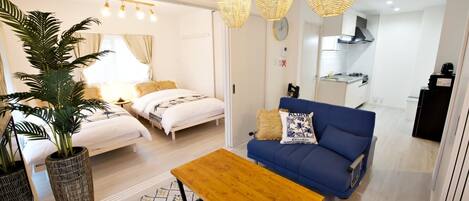 Departamento, 3 habitaciones, para no fumadores | Área de sala de estar | Televisión de pantalla plana