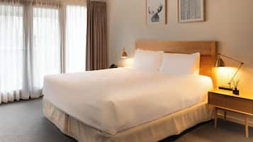 Balcony King | Premium bedding, pillow-top beds, minibar, desk