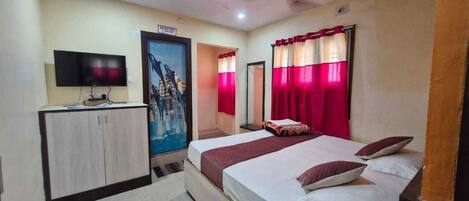 Premium bedding, down duvets, laptop workspace