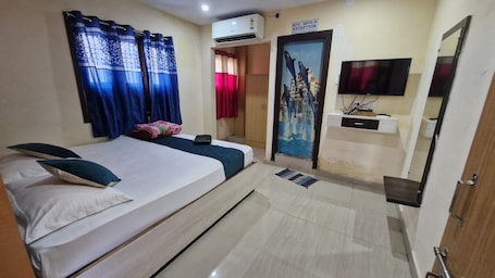 Premium bedding, down comforters, laptop workspace