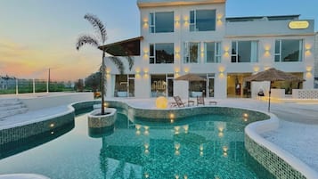 Seasonal outdoor pool, pool umbrellas, pool loungers
