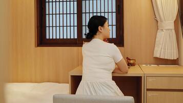 Premium bedding, memory foam beds, desk, laptop workspace