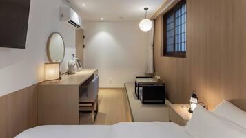 Deluxe - No Parking | Seprai premium, busa memori, meja kerja, dan ruang kerja ramah laptop