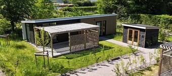 Luxury holiday home surrounded by water