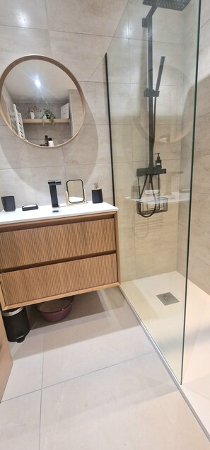 Shower, hair dryer, towels, soap