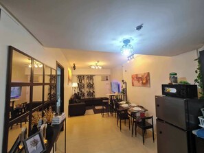 Condo, 1 Bedroom, Accessible, Smoking | Dining room - Spacious Suite in Pasig Cityurban Metro Escape (Pasig)