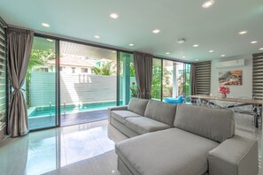 Exclusive Villa, 4 Bedrooms, Private Pool, Pool View | Living area | 36-inch flat-screen TV with cable channels - Private Pool Villa UTK3 near Kata Beach (Karon)