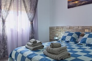 3 habitaciones, tabla de planchar con plancha, wifi y ropa de cama 