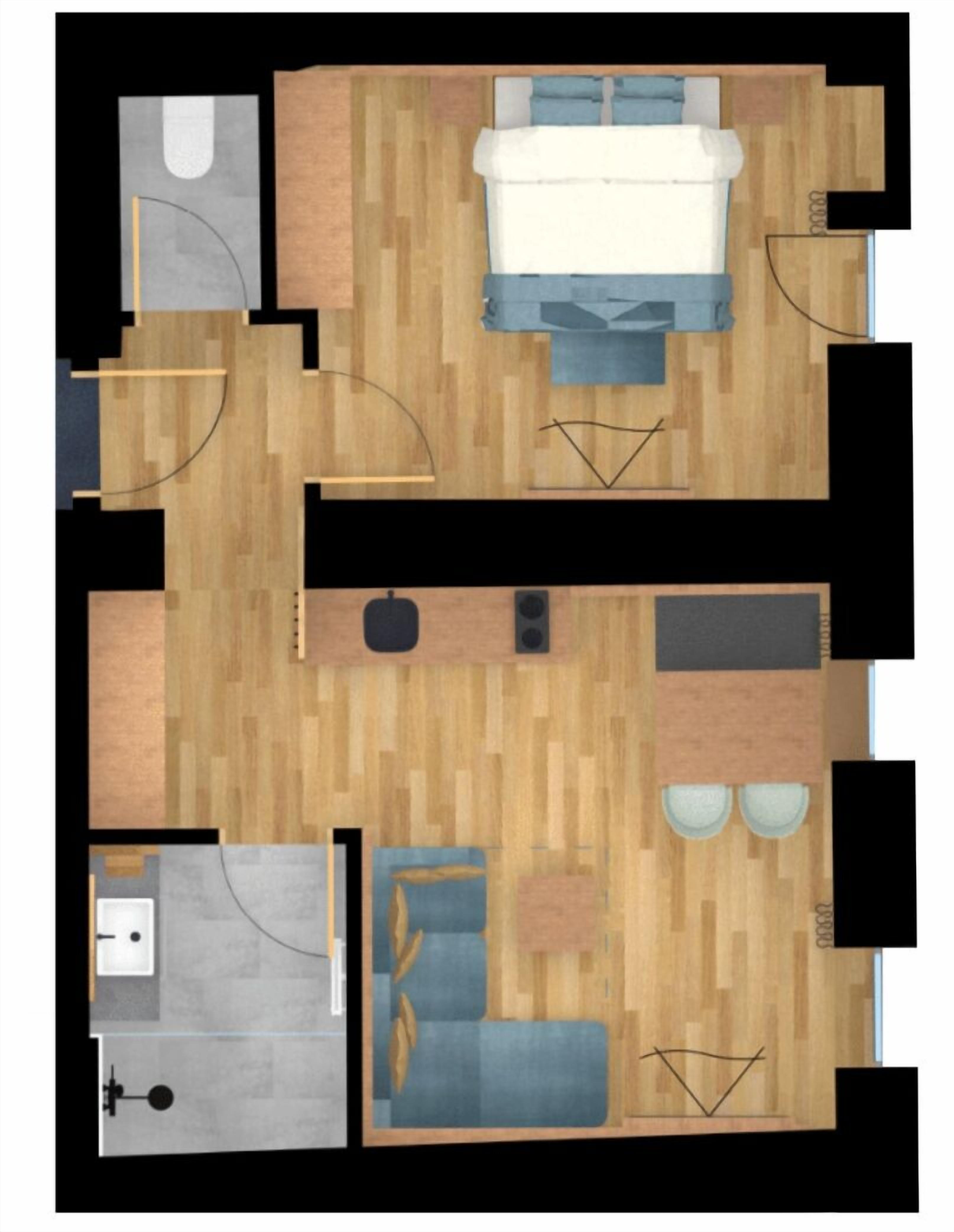 Un plan d’étage d’une chambre d’hôtel comprenant un lit, un bureau, une chaise, une petite table, un canapé et une salle de bain.