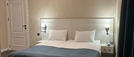Deluxe Double Room, City View | Premium bedding, minibar, in-room safe, desk