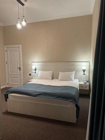 Ropa de cama de alta calidad y minibar
