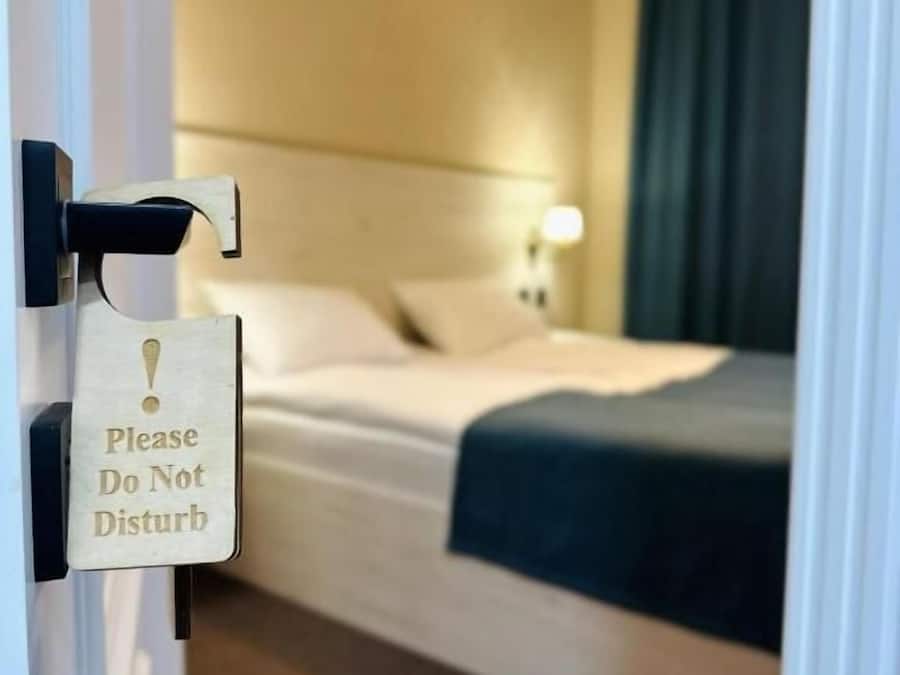 Deluxe Double Room, City View | Premium bedding, minibar, in-room safe, individually decorated