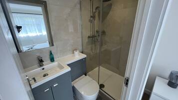 Shower, bidet, towels, soap