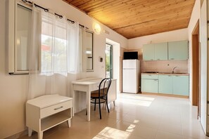 Fridge, stovetop, cookware/dishes/utensils