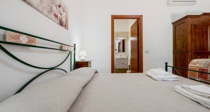 Chambre 'Col Moschin - Camera 2' avec Terrasse partagée, Wi-Fi et Climatisation