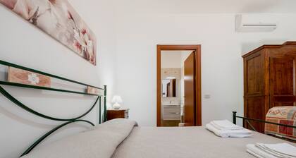 Chambre 'Col Moschin - Camera 2' avec Terrasse partagée, Wi-Fi et Climatisation