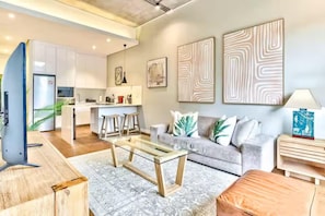 Departamento senior, balcón | Área de sala de estar