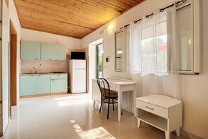 Fridge, stovetop, cookware/dishes/utensils