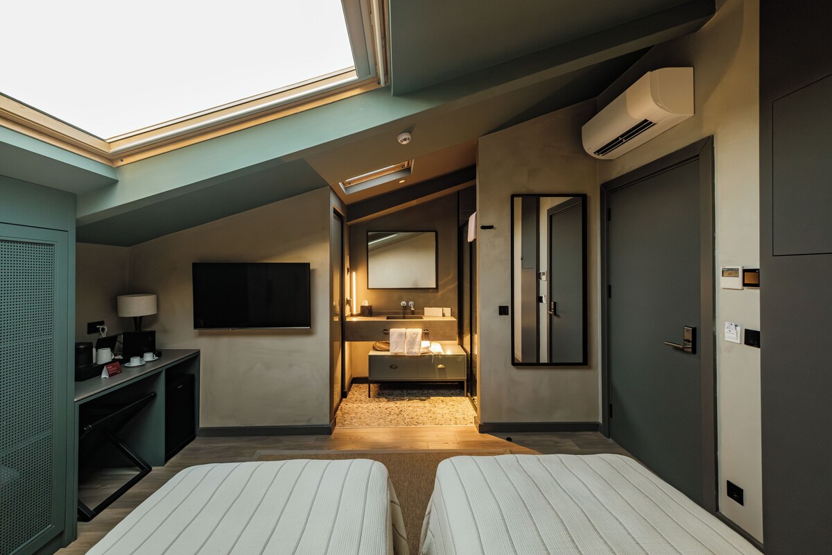 Seprai premium, minibar, Wi-Fi gratis, dan seprai linen