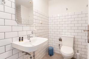 Shower, hair dryer, soap, shampoo