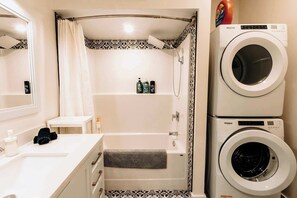 Shower, hair dryer, shampoo