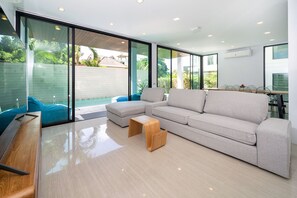 Exclusive Villa, 4 Bedrooms, Private Pool, Garden View | Living area | 36-inch flat-screen TV with cable channels