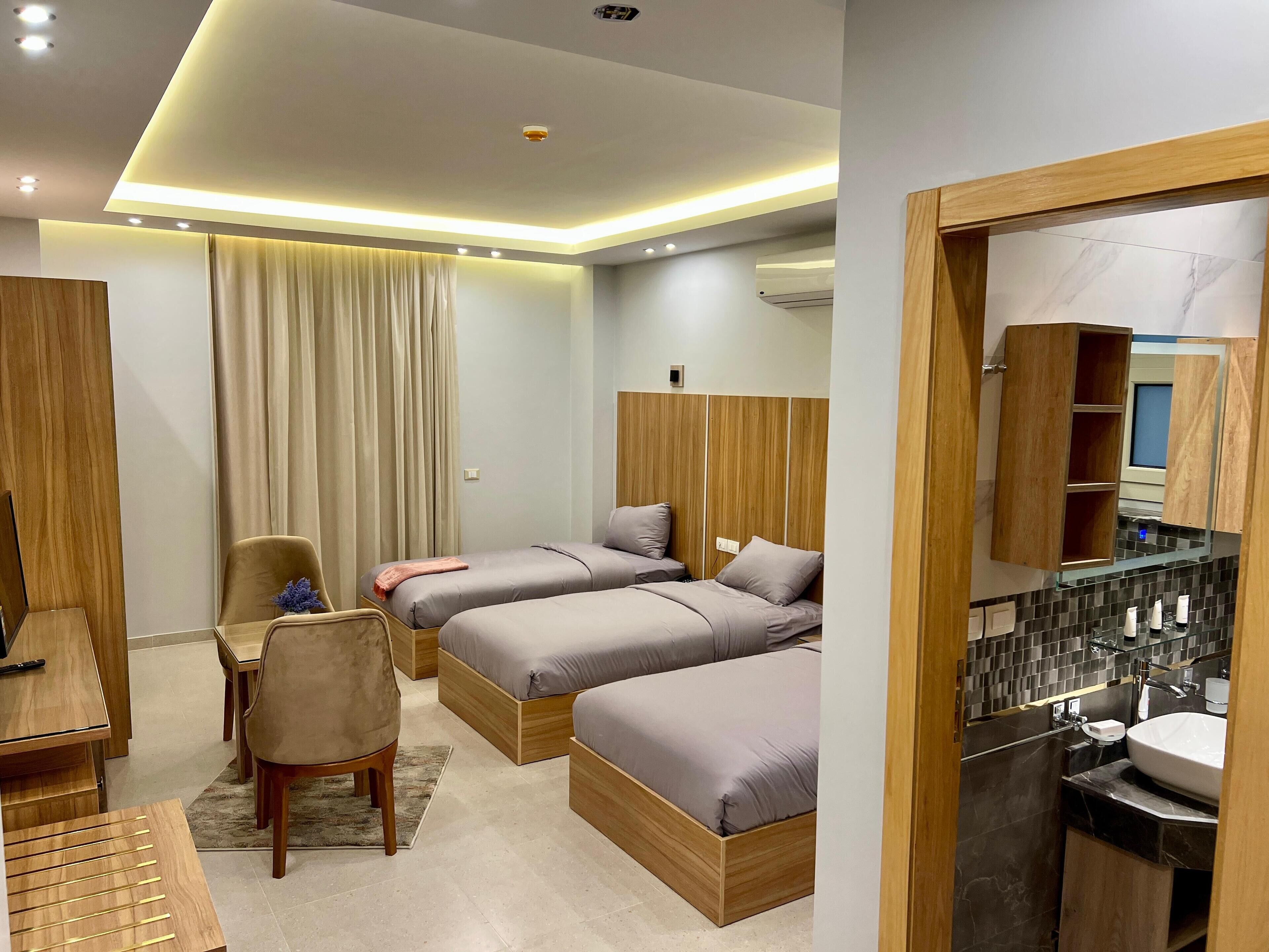 Triple Room | In-room safe, desk, blackout curtains, soundproofing