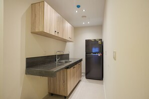 Suite, Balcony | Private kitchen - Elite hotel (Sheikh Zayed City)