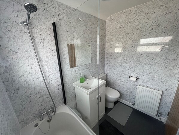 Hair dryer, towels, soap, shampoo