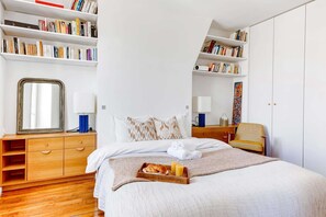 2 bedrooms, desk, iron/ironing board, travel crib