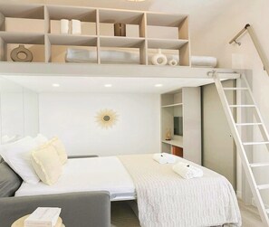 Studio Signature | Aire de séjour | Téléviseur connecté de 80 cm avec télévision numérique