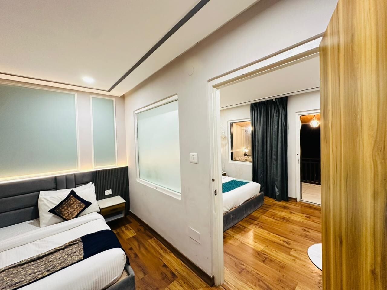 Family Suite Lake facing | Desk, rollaway beds, bed sheets