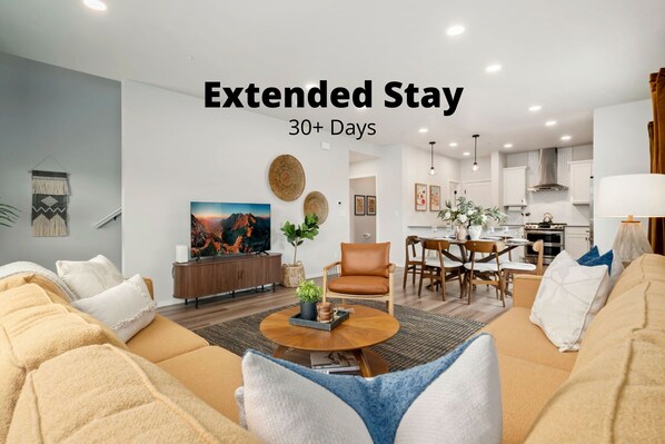 Townhome, Multiple Beds, Patio (2938 Barnstormer St Unit #1) | Living area | 55-inch flat-screen TV with digital channels