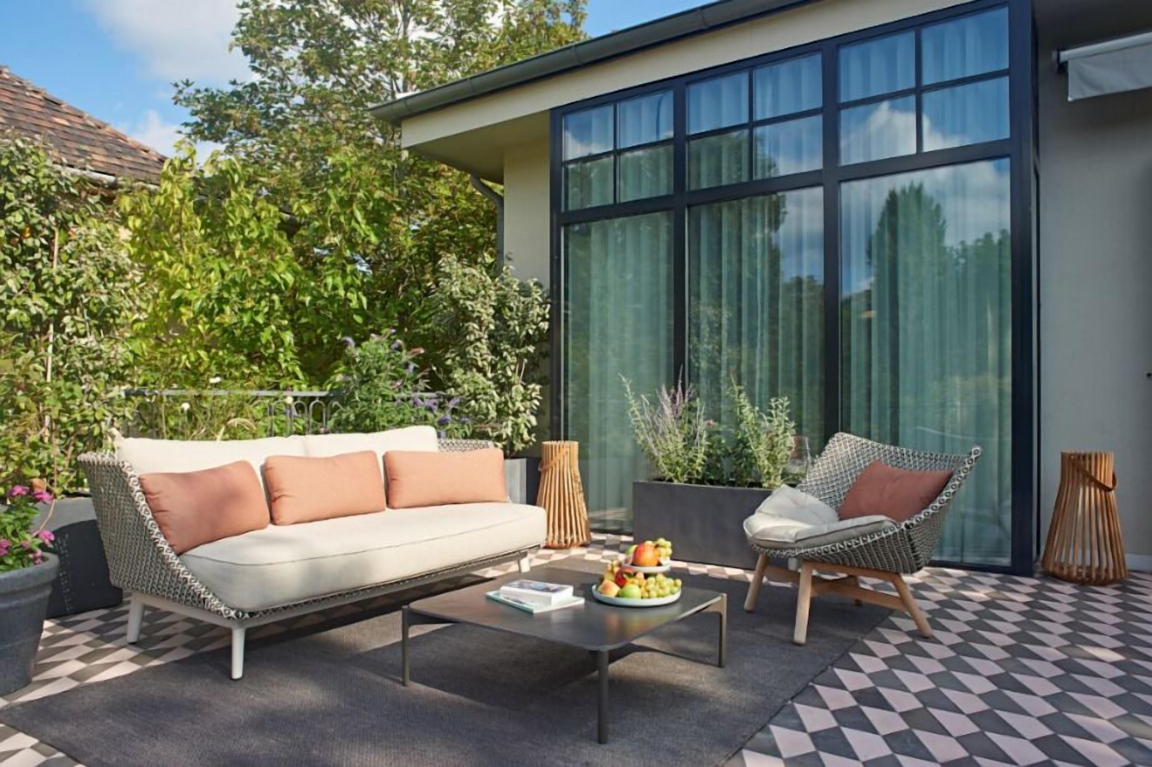 Deluxe tweepersoonskamer, balkon, uitzicht op tuin | Een kluis op de kamer, verduisterende gordijnen, geluiddichte muren