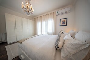 4 slaapkamers, een strijkplank/strijkijzer, wifi, beddengoed