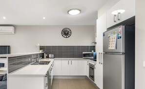 Fridge, microwave, toaster, cookware/dishes/utensils