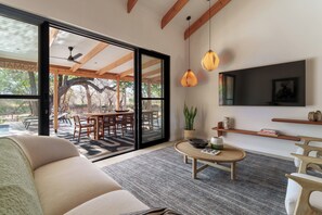 Luxury Villa, 2 Bedrooms, Patio, River View | Living area | Flat-screen TV, printers - Nomads Den - Safari Villas in Hoedspruit (Hoedspruit)