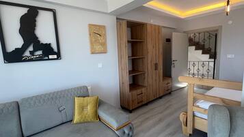 Suite estudio económica, vistas al mar | Zona de estar