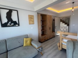Suite estudio económica, vistas al mar | Zona de estar