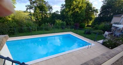 House in lovely gardens with shared pool in Dordogne, parking on site